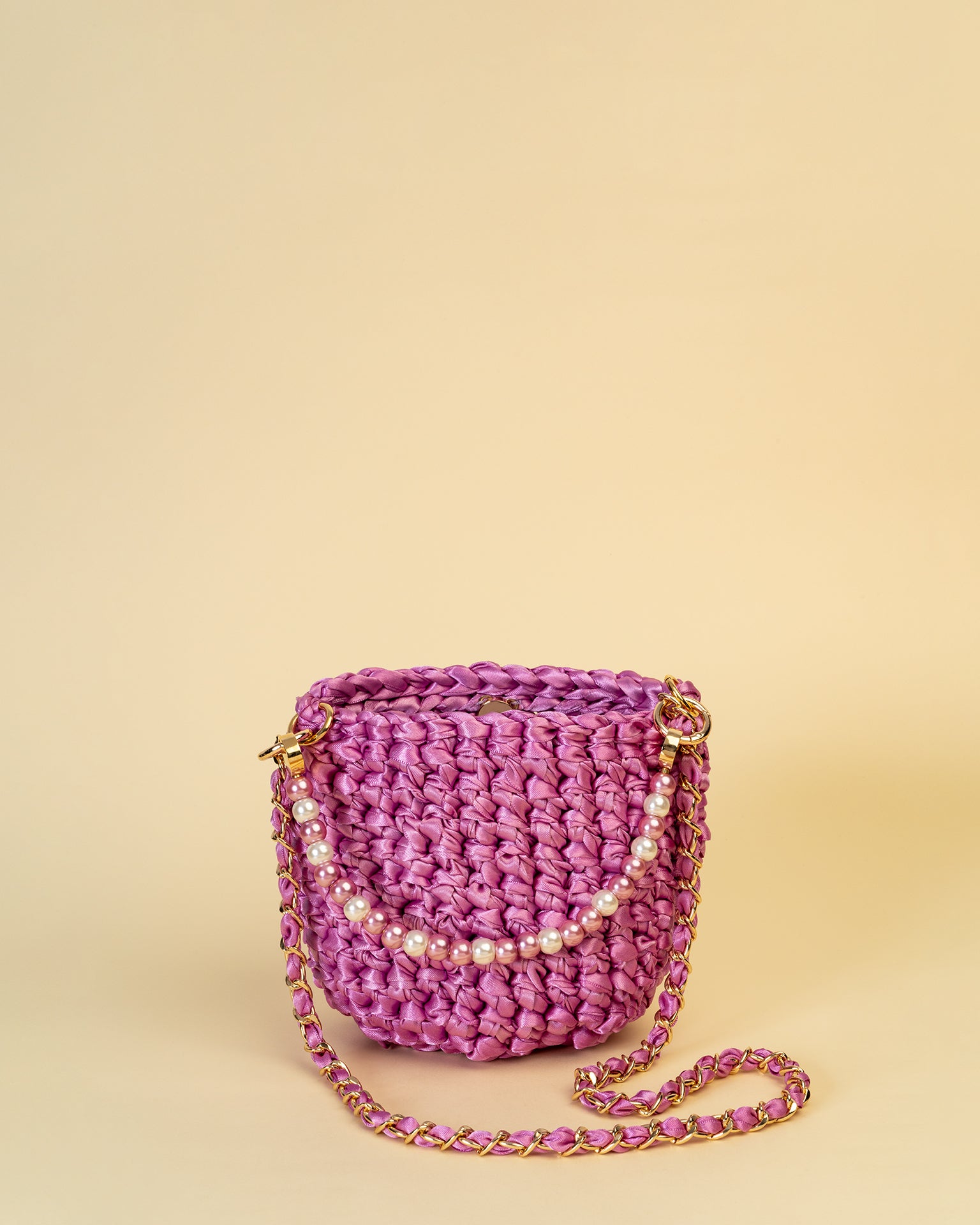 Bolso tejido con acabado - de color Malva elaborado en Cinta poliéster y metal de la marca LOLILU