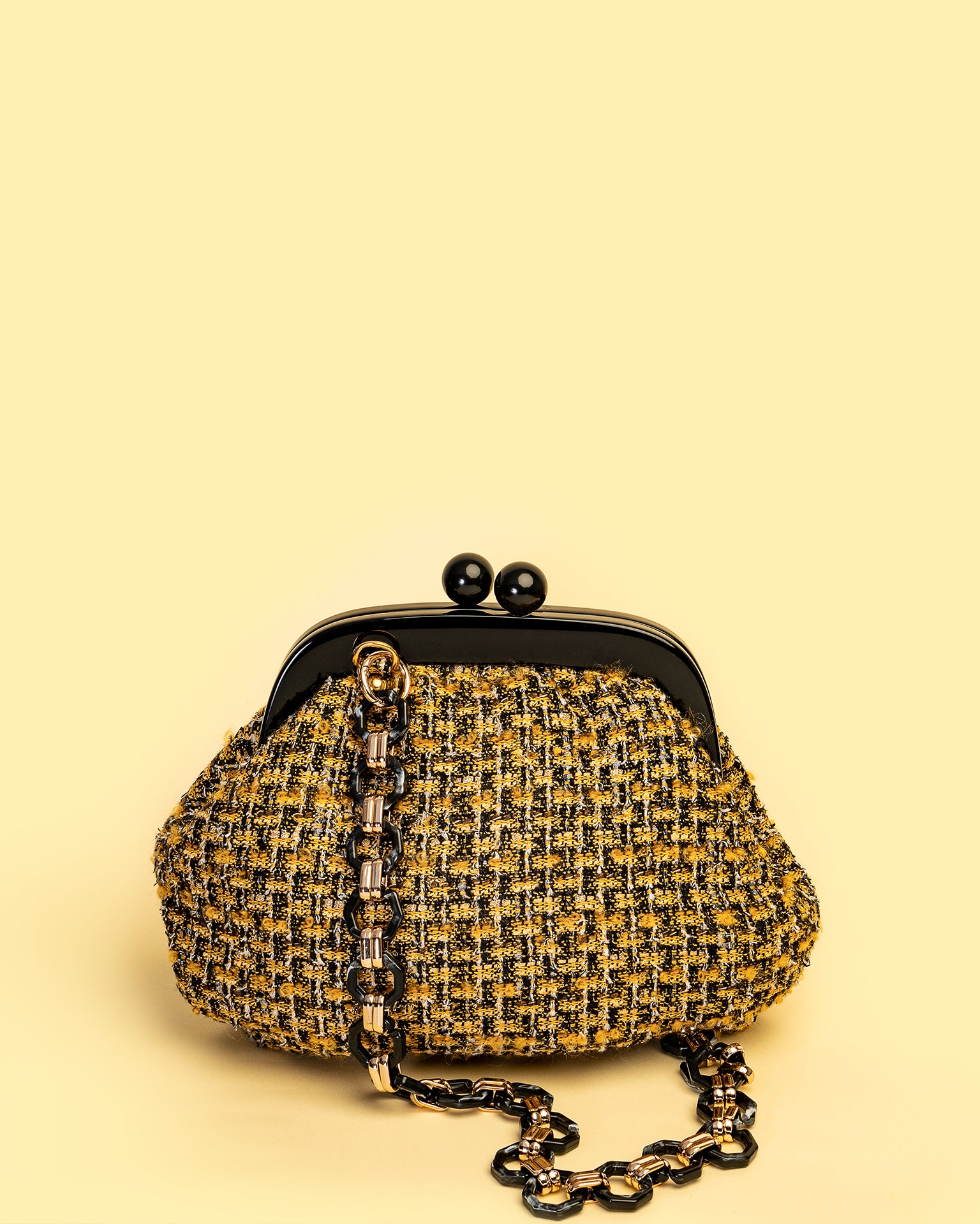 Bolso con Marco elaborado en Textil tweed   de la marca LOLILU