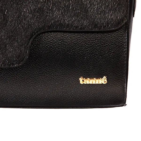 Bolso esmeralda elegante de la marca TANNÉ